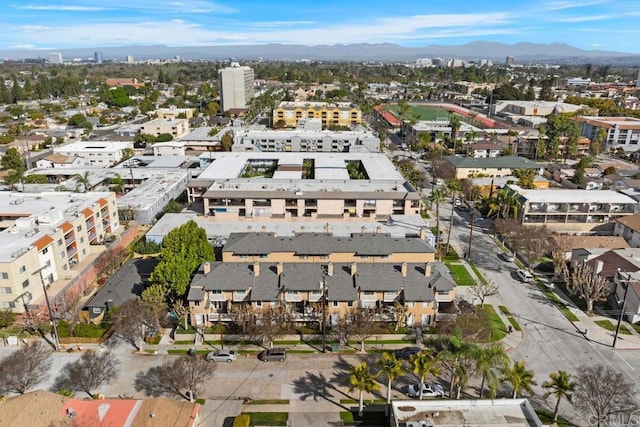 bird's eye view with a residential view and a mountain view