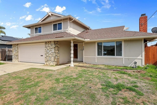 traditional-style home with a garage, stone siding, fence, and stucco siding