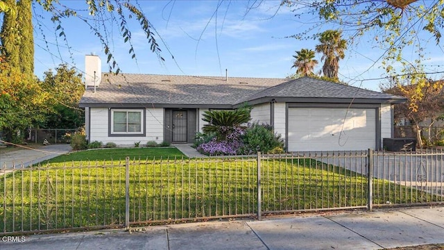 ranch-style home featuring driveway, a fenced front yard, a chimney, an attached garage, and a front lawn