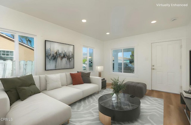 living room featuring wood finished floors and recessed lighting