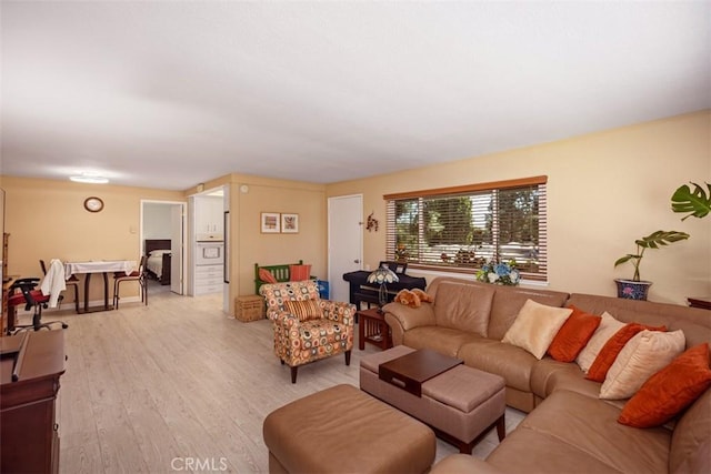 379 Avenida Castilla Unit Q, Laguna Woods, CA 92675 - living room featuring light wood-type flooring