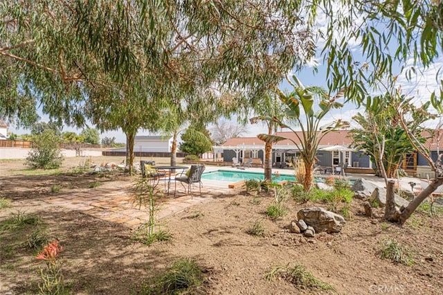 outdoor pool with a patio