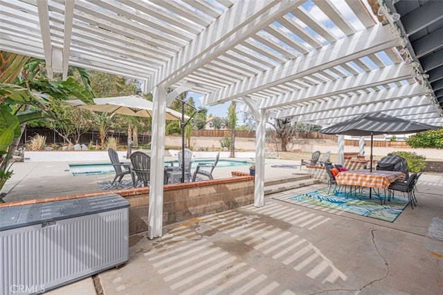 view of patio / terrace with a fenced backyard, a pergola, outdoor dining area, and a fenced in pool