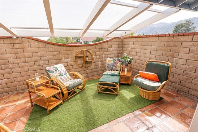 view of patio featuring a mountain view