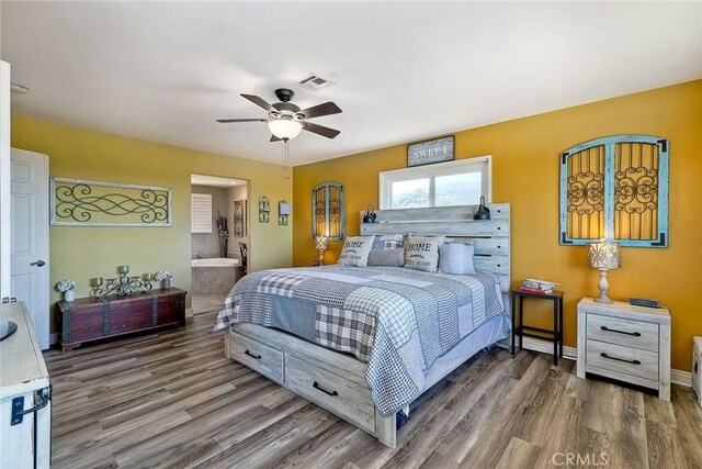 2056 Wonderview Dr, Vista, CA 92084 - bedroom with wood finished floors, ensuite bath, and ceiling fan