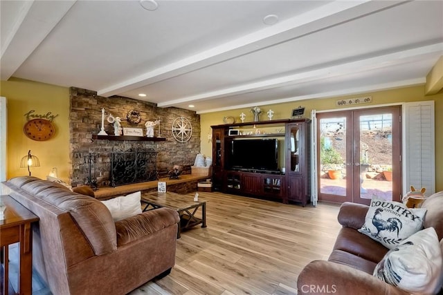 2056 Wonderview Dr, Vista, CA 92084 - living room with beamed ceiling, french doors, light wood-style floors, and a fireplace