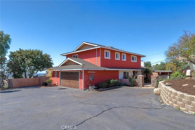 2056 Wonderview Dr, Vista, CA 92084 - traditional-style house featuring asphalt driveway and an attached garage
