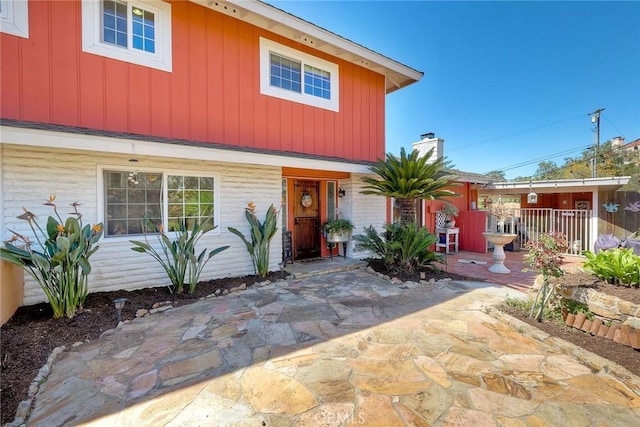 2056 Wonderview Dr, Vista, CA 92084 - view of front facade featuring a patio area and a chimney