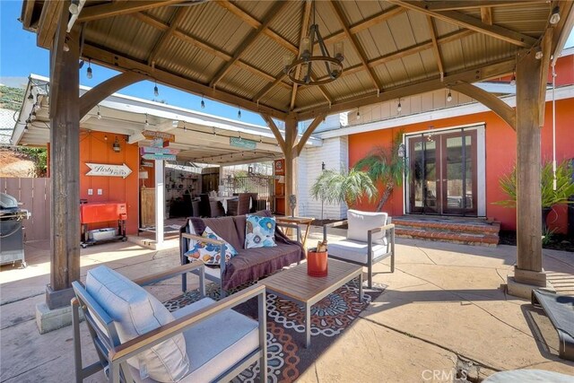 2056 Wonderview Dr, Vista, CA 92084 - view of patio with entry steps, a gazebo, an outdoor hangout area, french doors, and a grill