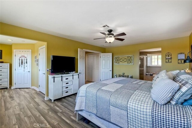 2056 Wonderview Dr, Vista, CA 92084 - bedroom featuring wood finished floors and a ceiling fan
