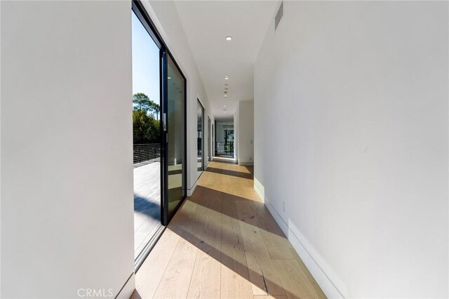 4653 Vanalden Ave, Tarzana, CA 91356 - corridor with wood-type flooring, baseboards, and recessed lighting