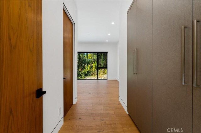 4653 Vanalden Ave, Tarzana, CA 91356 - corridor with light wood finished floors, recessed lighting, and baseboards