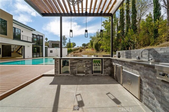 4653 Vanalden Ave, Tarzana, CA 91356 - view of patio featuring a pergola, an outdoor pool, a sink, beverage cooler, and stairs