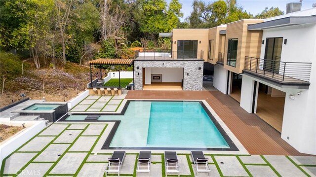 4653 Vanalden Ave, Tarzana, CA 91356 - outdoor pool with an in-ground hot tub and a patio area