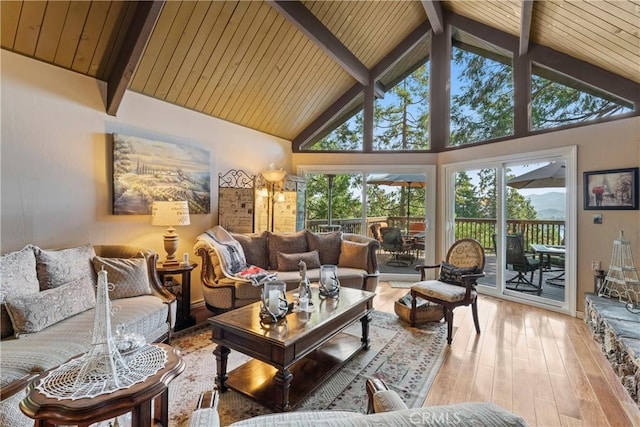 750 Zurich Dr, Lake Arrowhead, CA 92352 - living room with a healthy amount of sunlight, high vaulted ceiling, beamed ceiling, and wood-type flooring