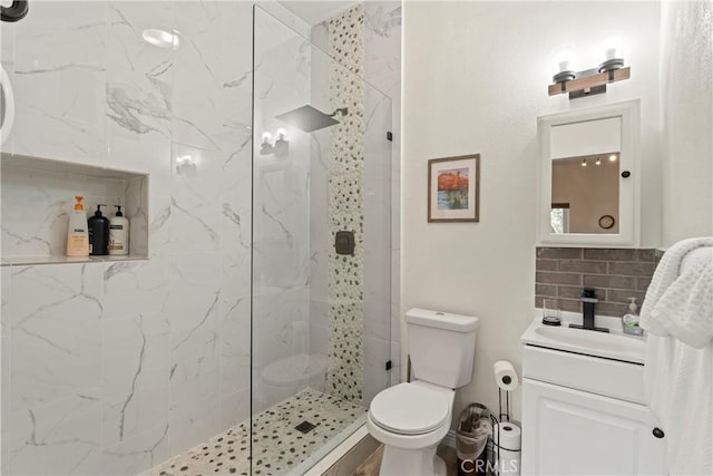 750 Zurich Dr, Lake Arrowhead, CA 92352 - bathroom featuring a marble finish shower, vanity, and toilet