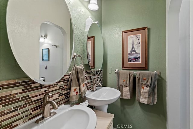750 Zurich Dr, Lake Arrowhead, CA 92352 - bathroom with a sink, tasteful backsplash, and a textured wall