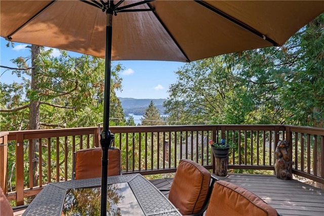 750 Zurich Dr, Lake Arrowhead, CA 92352 - deck featuring a mountain view and outdoor dining space