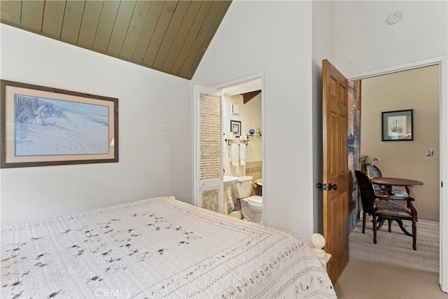 750 Zurich Dr, Lake Arrowhead, CA 92352 - carpeted bedroom with lofted ceiling and ensuite bath