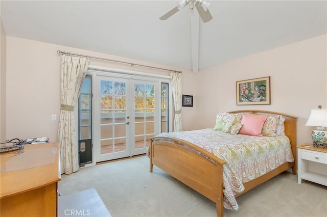 bedroom with lofted ceiling with beams, access to outside, french doors, and carpet