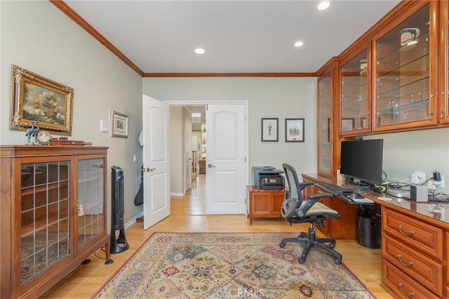 office area with light wood-style flooring, ornamental molding, baseboards, and recessed lighting