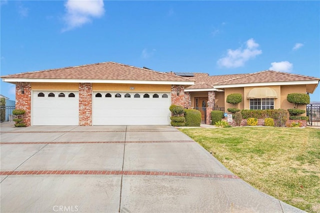 view of front facade featuring an attached garage, fence, driveway, roof mounted solar panels, and a front yard