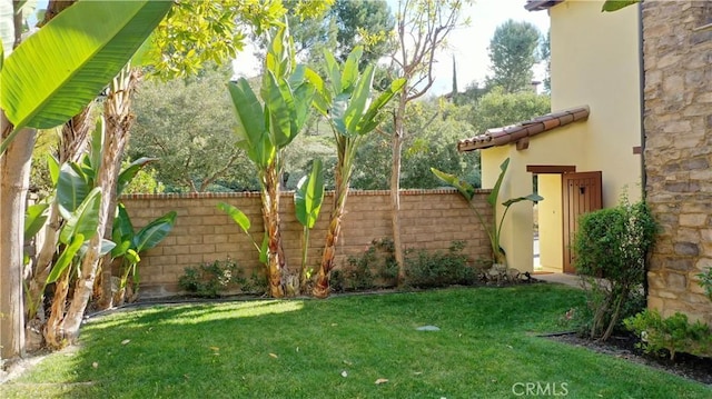 view of yard with fence