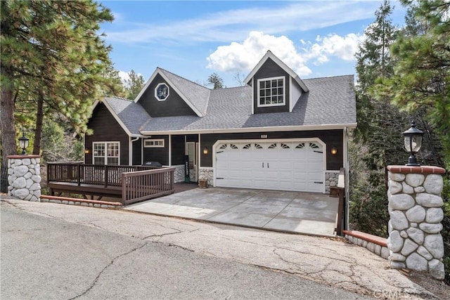 892 Breithorn Dr, Lake Arrowhead, CA 92352 - view of front of property with an attached garage, a shingled roof, stone siding, and concrete driveway