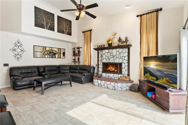 892 Breithorn Dr, Lake Arrowhead, CA 92352 - living area with ceiling fan, a fireplace, and a high ceiling