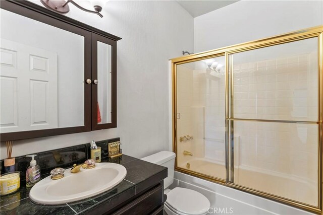 892 Breithorn Dr, Lake Arrowhead, CA 92352 - full bathroom featuring vanity, combined bath / shower with glass door, and toilet