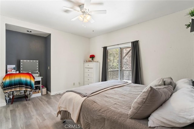 892 Breithorn Dr, Lake Arrowhead, CA 92352 - bedroom featuring baseboards, ceiling fan, wood finished floors, and access to exterior