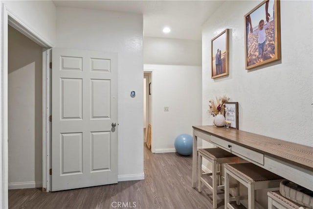 892 Breithorn Dr, Lake Arrowhead, CA 92352 - hallway with baseboards and wood finished floors