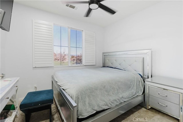 bedroom with a ceiling fan and visible vents