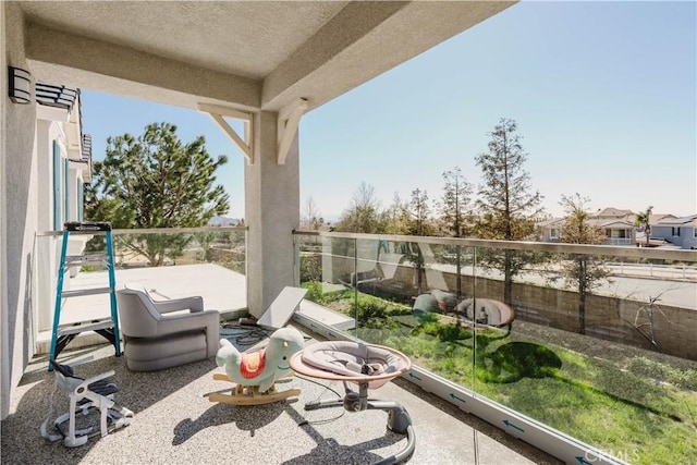 balcony featuring a sunroom