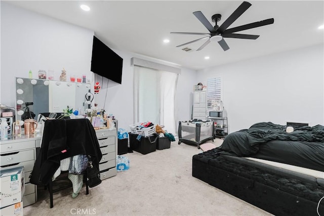 bedroom featuring a ceiling fan, carpet, and recessed lighting