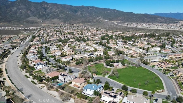 aerial view featuring a mountain view and a residential view