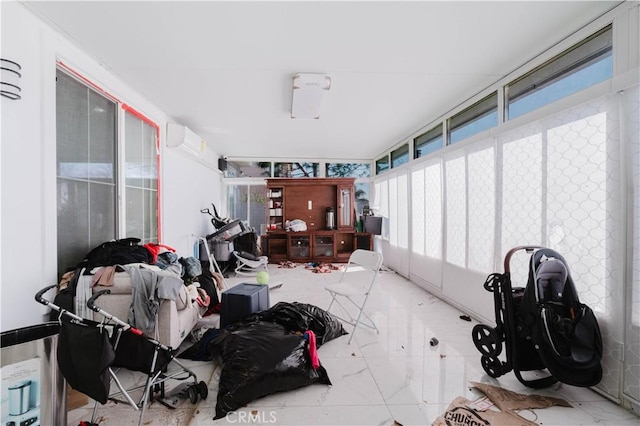 sunroom with a wall unit AC