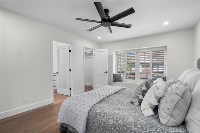 bedroom with ceiling fan, baseboards, wood finished floors, and recessed lighting