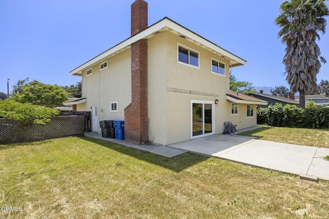 205 Bluefield Ave, Newbury Park, CA 91320 - rear view of property featuring stucco siding, a chimney, and a patio area