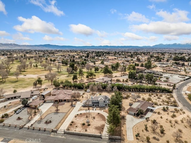 bird's eye view with a residential view and a mountain view