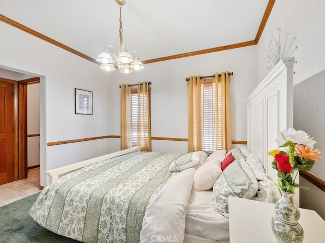 tiled bedroom with ornamental molding and an inviting chandelier