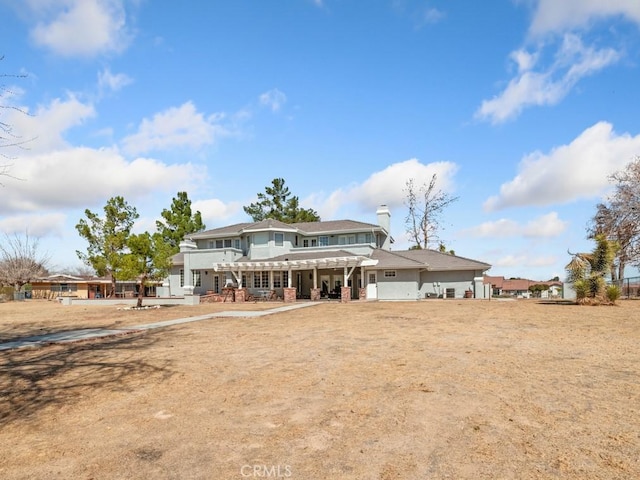 view of front of home with a chimney