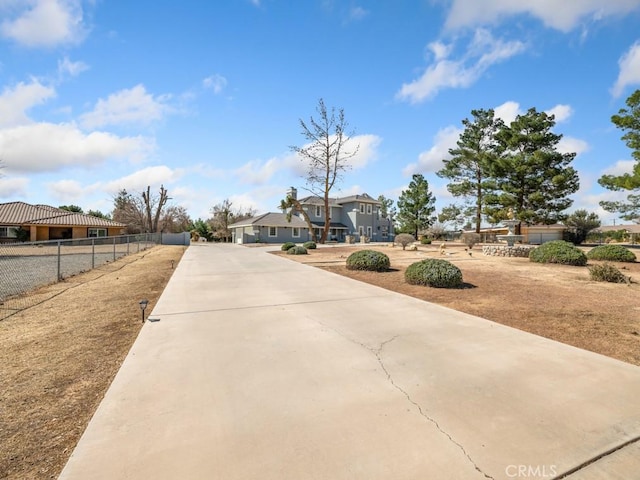 view of road featuring driveway