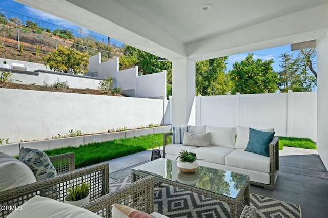 view of patio / terrace with outdoor lounge area and a fenced backyard