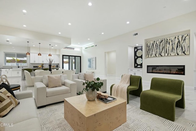 724 Via Arroyo, Ventura, CA 93003 - living room featuring recessed lighting and a glass covered fireplace