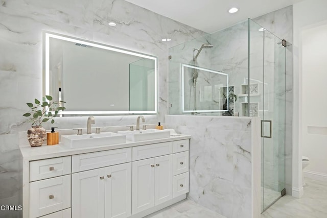 724 Via Arroyo, Ventura, CA 93003 - full bathroom with marble finish flooring, a marble finish shower, double vanity, tile walls, and recessed lighting