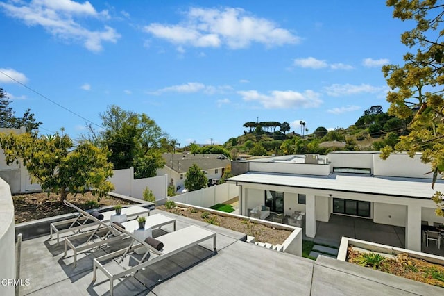724 Via Arroyo, Ventura, CA 93003 - fenced backyard featuring a patio, outdoor dining area, and an outdoor hangout area