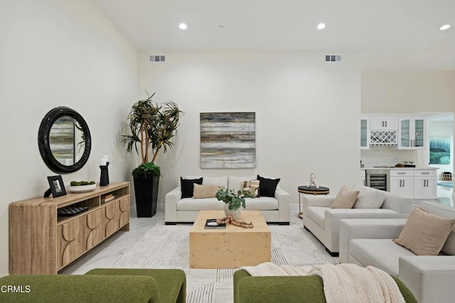 724 Via Arroyo, Ventura, CA 93003 - living area featuring beverage cooler, recessed lighting, light marble finish floors, and a dry bar