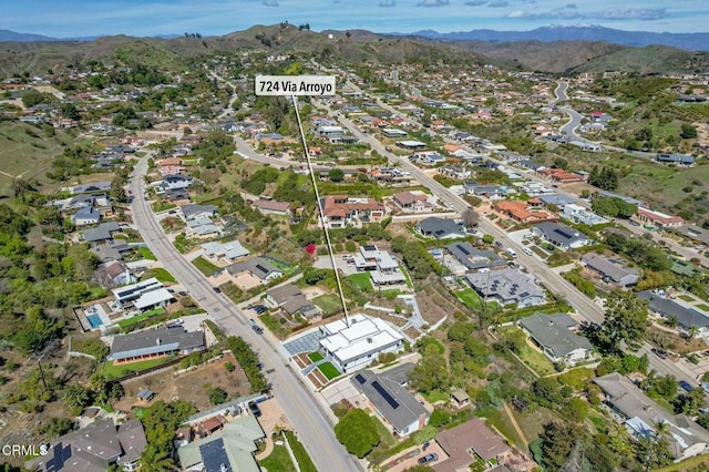 724 Via Arroyo, Ventura, CA 93003 - aerial overview of property's location featuring mountains and nearby suburban area