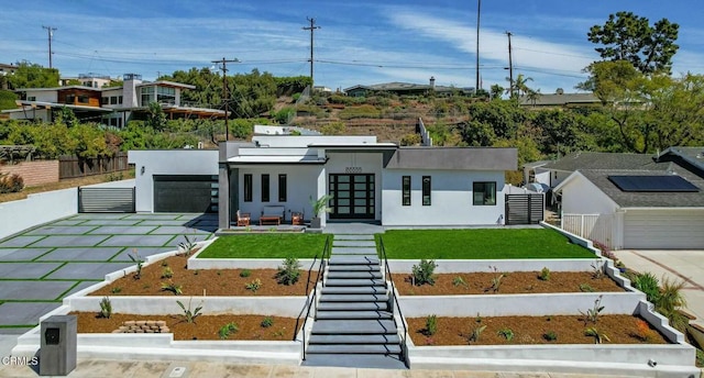 724 Via Arroyo, Ventura, CA 93003 - modern home with french doors, stucco siding, stairway, and driveway